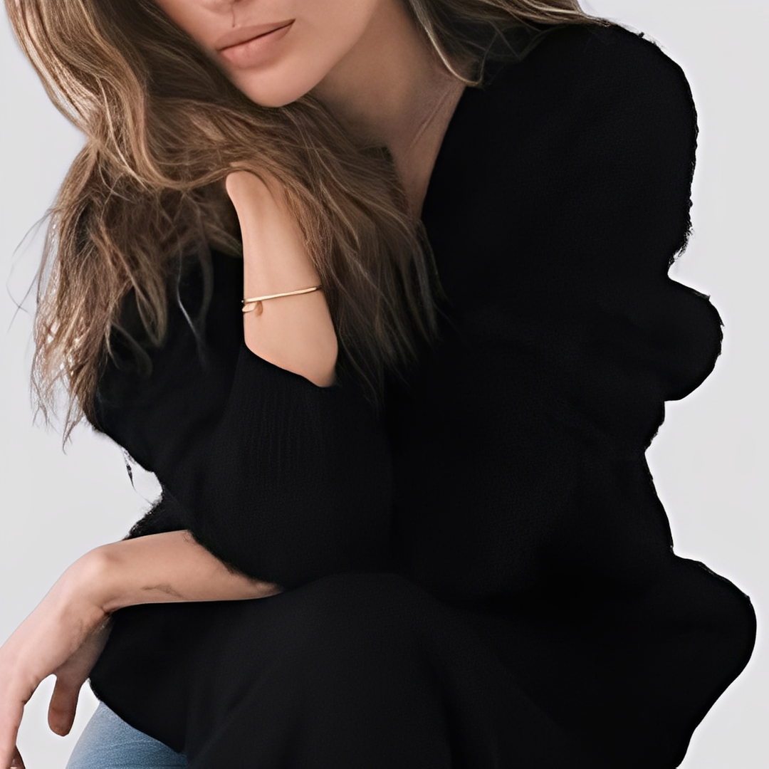 Suéter feminino versátil, essencial para a moda inverno, oferecendo conforto e elegância em qualquer ocasião.