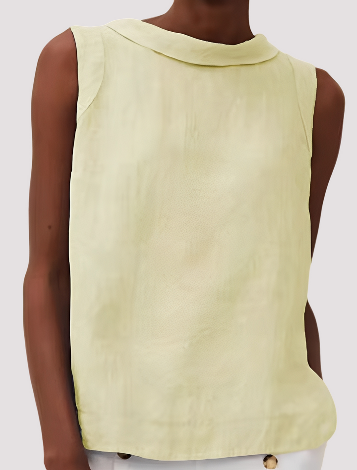 Top feminino casual de cor sólida, sem mangas e leve. Blusa essencial para o verão, oferecendo moda e conforto descontraído.