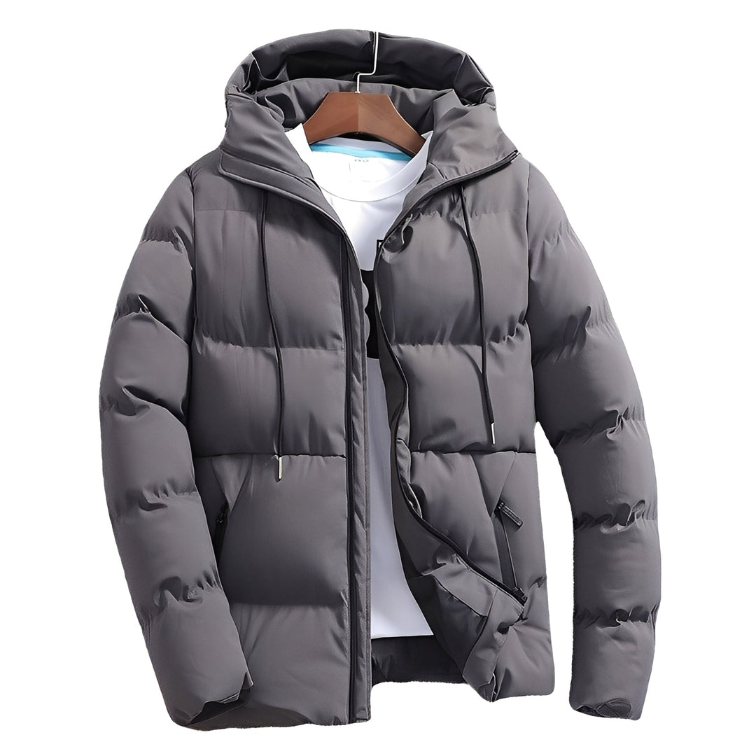 Jaqueta masculina acolchoada com capuz, ideal para inverno e outono. Estilo casual e moderno, oferece proteção contra vento.
