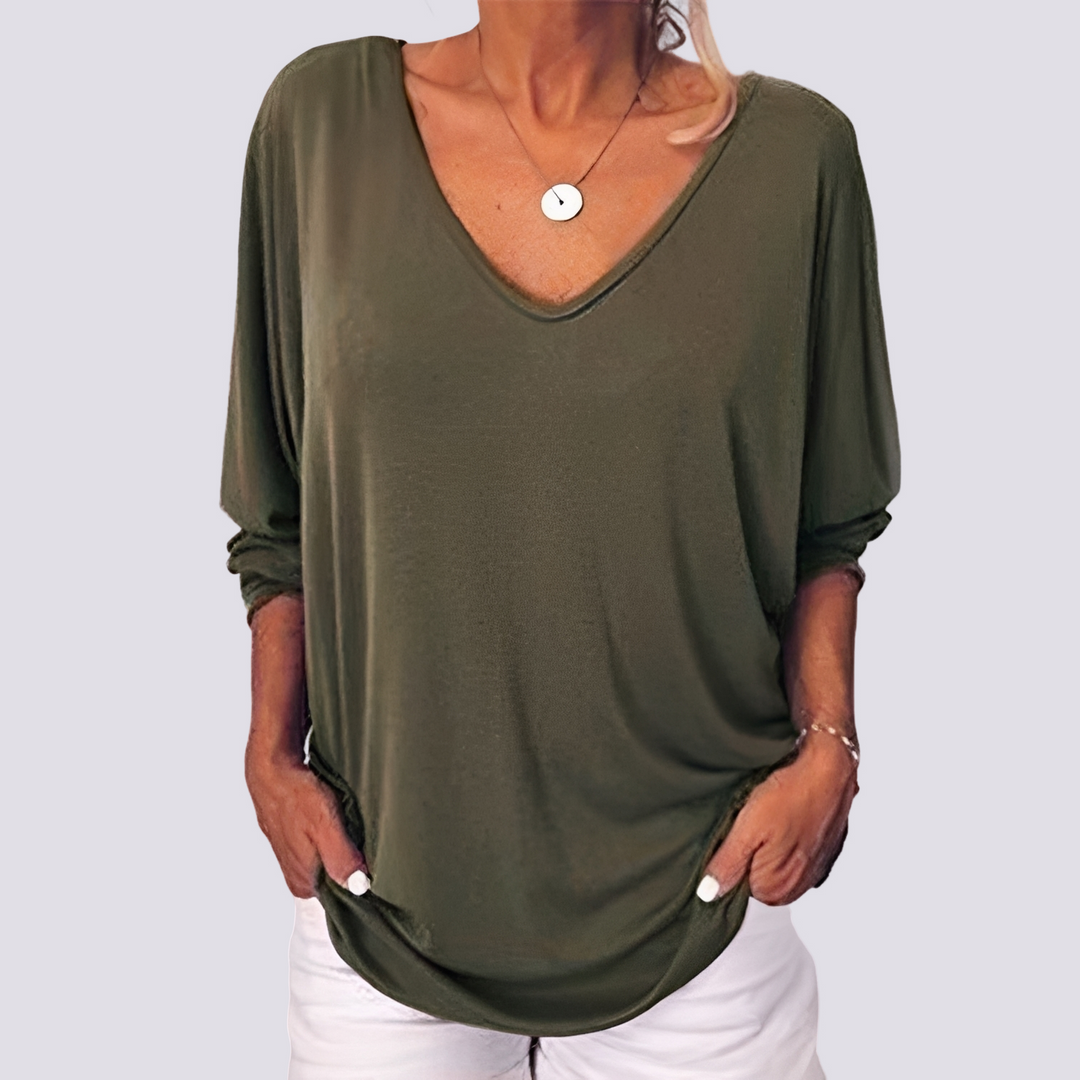 Blusa feminina de verão com estilo único: costas abotoadas e caimento confortável. Moda casual feminina.