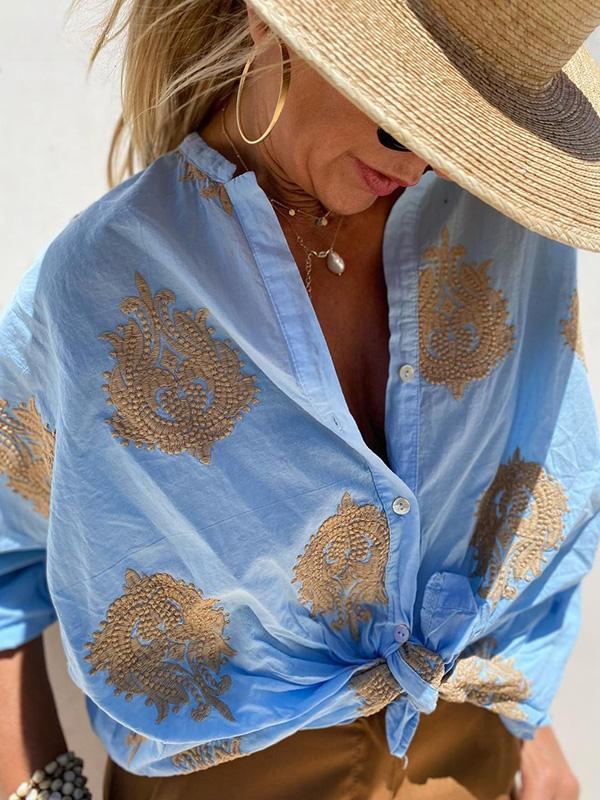 Top feminino elegante e confortável, blusa bordada com botões, para um visual versátil e estiloso.