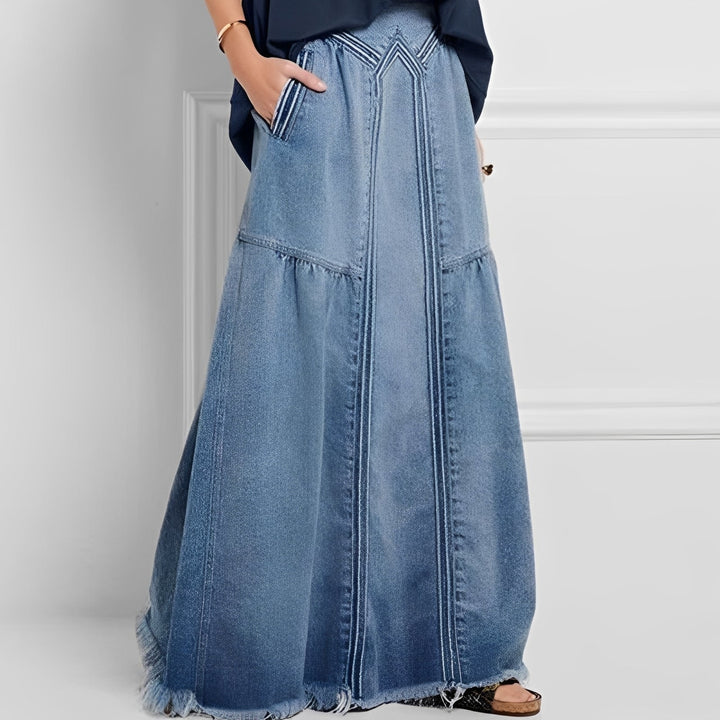 Saia jeans feminina elegante com bolso, perfeita para moda casual de verão. Roupa versátil azul-marinho.