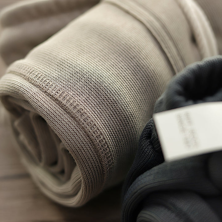 Shorts masculinos de verão estilo clássico solto, disponíveis em caqui, cinza e preto.