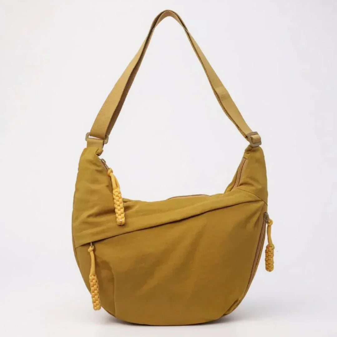 Prática bolsa de ombro Aria de nylon, espaçosa e elegante para acompanhar seu ritmo diário.