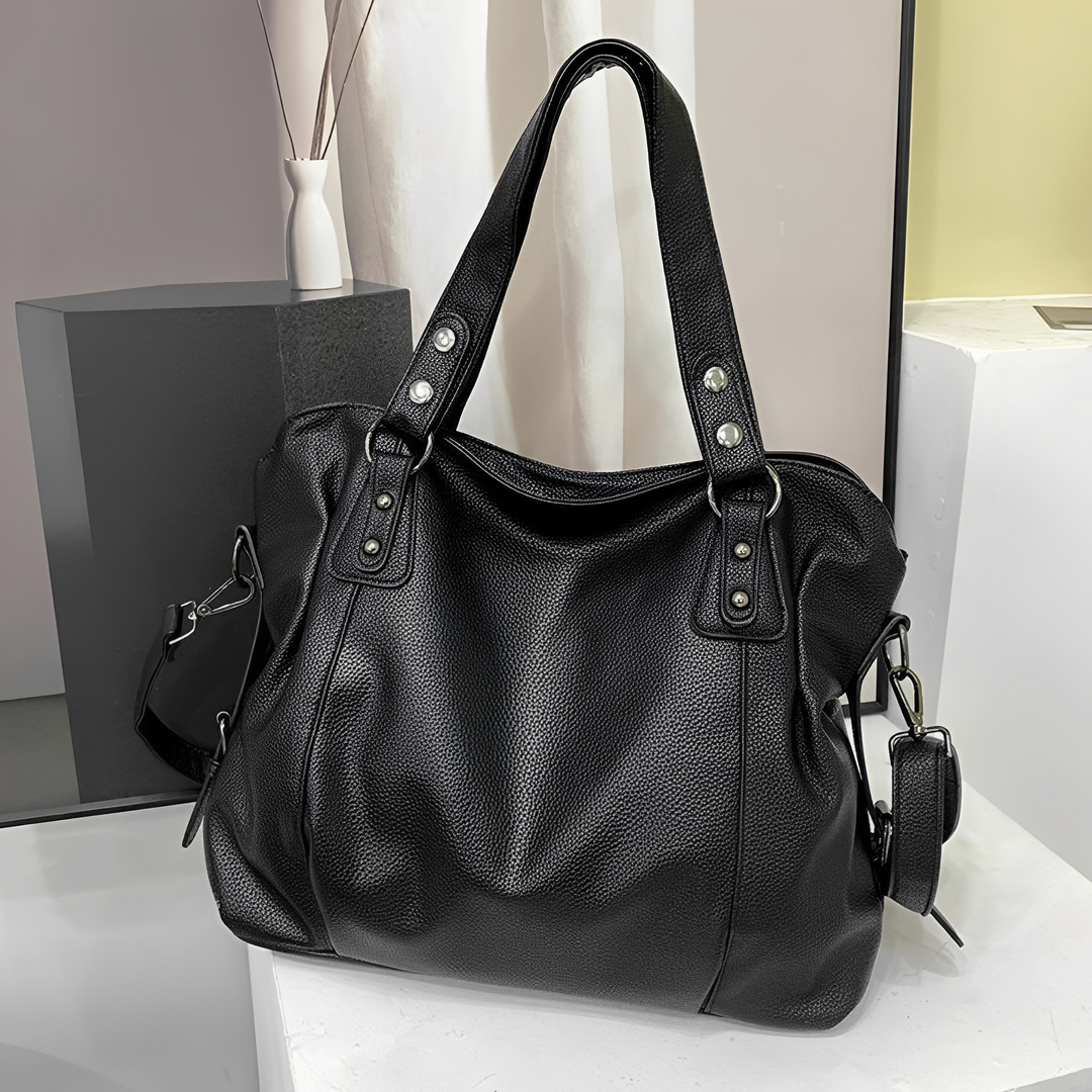 Moda feminina: bolsa grande elegante de ombro, acessório versátil e chic para o seu dia a dia.