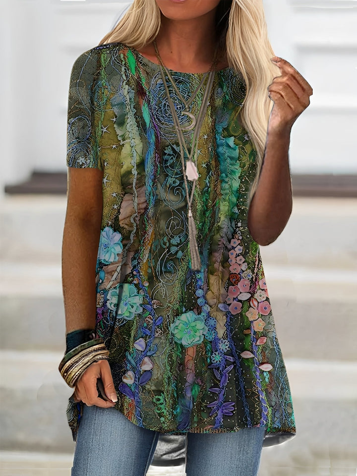 Blusa feminina Rita colorida e versátil, com mangas curtas, essencial para a moda primavera-verão.