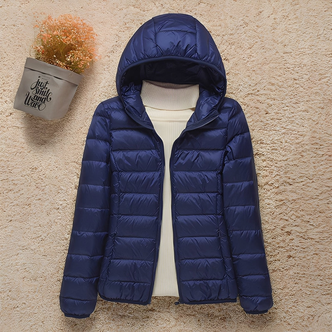 Roupa de outono: Jaqueta acolchoada feminina Milani versátil, oferecendo estilo e leveza.