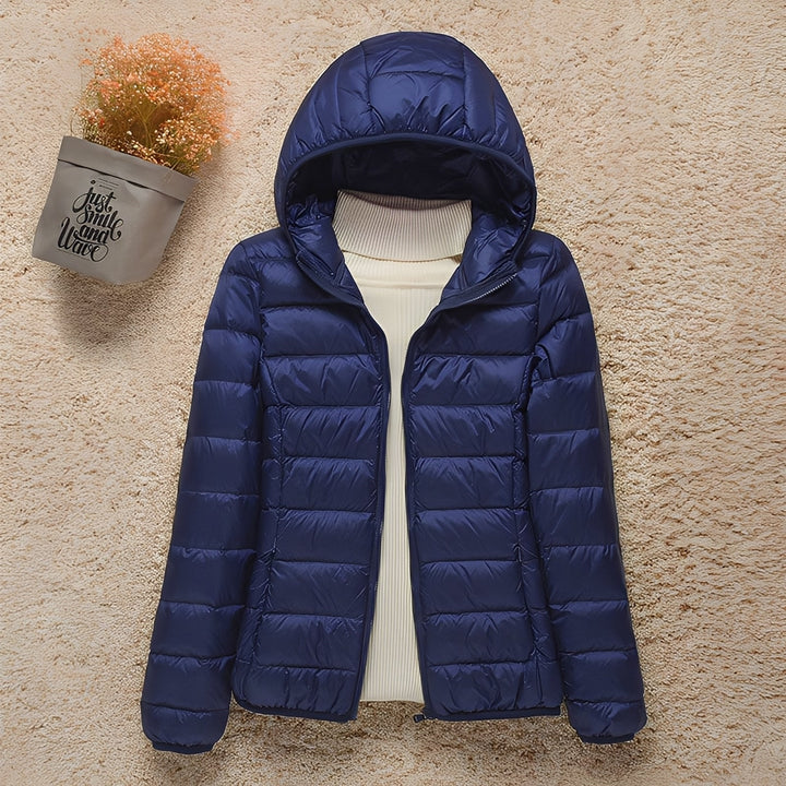 Roupa de outono: Jaqueta acolchoada feminina Milani versátil, oferecendo estilo e leveza.
