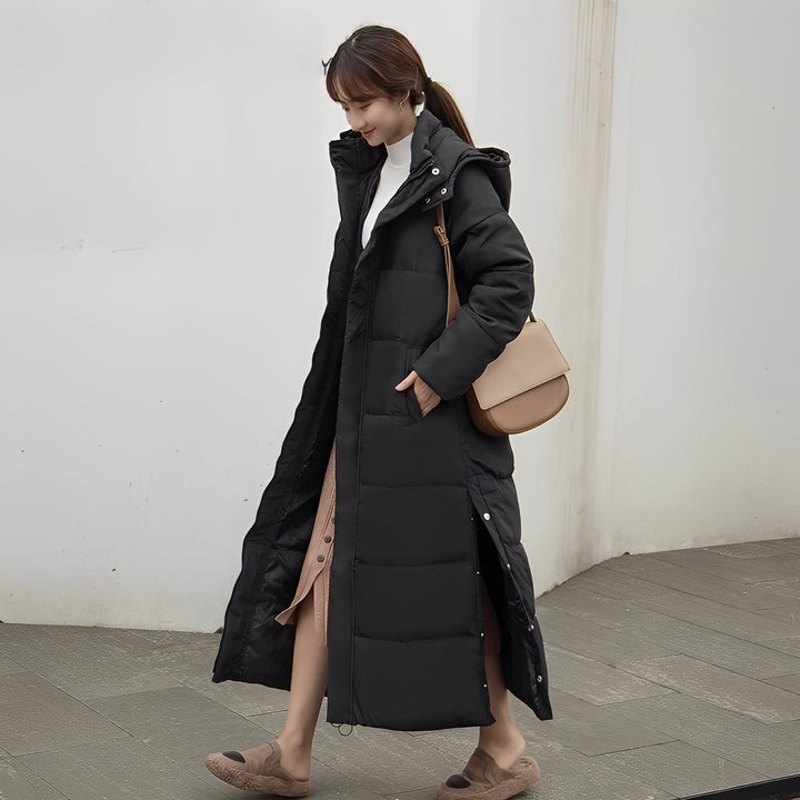 Agasalho feminino acolchoado longo para inverno. Roupa exterior quente e confortável, perfeita para o frio.