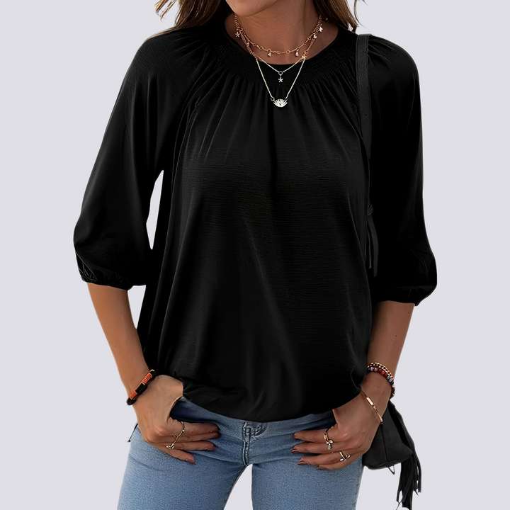 Blusa de verão feminina com decote redondo, proporcionando conforto e estilo para o dia a dia.