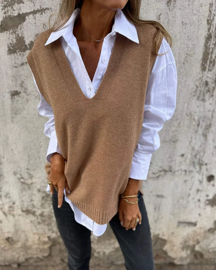Colete feminino elegante para sobreposição, ideal para outono e inverno. Peça versátil de moda e conforto.