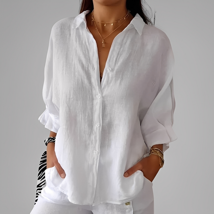 Blusa feminina manga longa versátil. Conforto e elegância para moda casual e roupa de trabalho. Cores variadas.