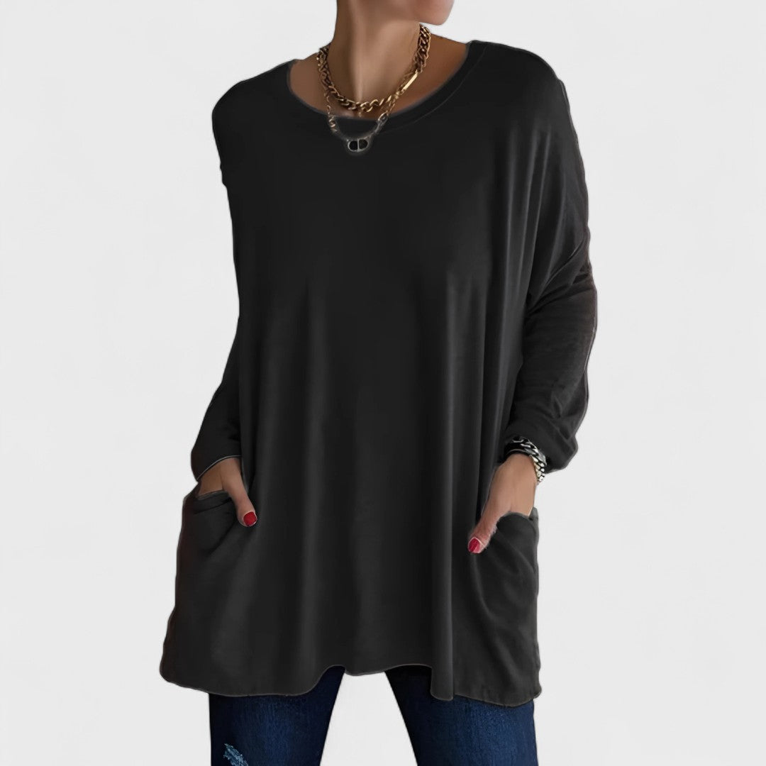 Blusa feminina Moira de manga longa relaxada para conforto e estilo casual no dia a dia.