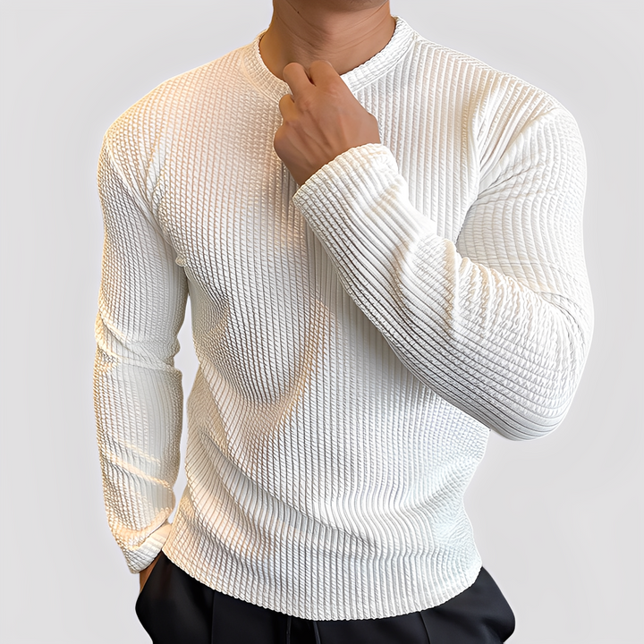 Detalhe da textura da camisola masculina Albert, um pulôver de inverno aconchegante que garante conforto e estilo elegante casual.