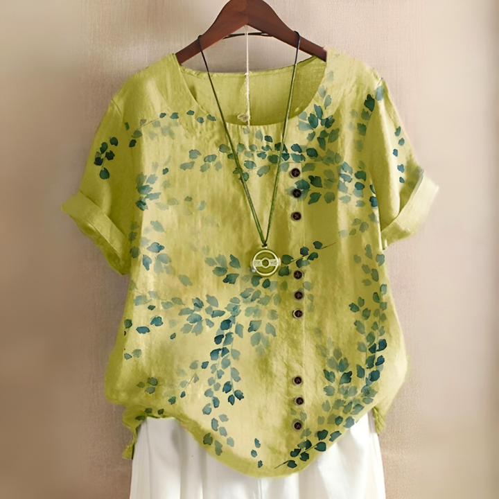 Blusa feminina elegante com estampa de folhas para primavera/verão. Conforto e estilo em roupa casual.