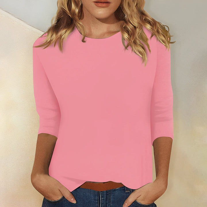 Blusa feminina versátil de manga 3/4, ideal para diversas ocasiões e estilo casual confortável.