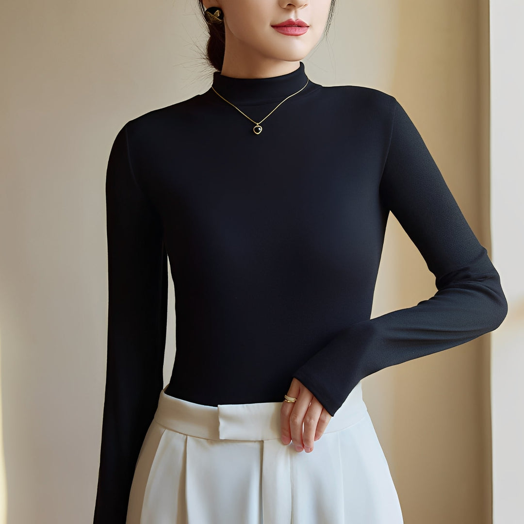 Top feminino elegante básico de gola alta. Conforto diário em moda feminina versátil para outono inverno.