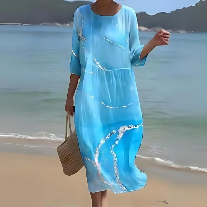 Alina Vestido Midi Fluido. Roupa feminina elegante e confortável. Ideal para eventos de primavera e verão.