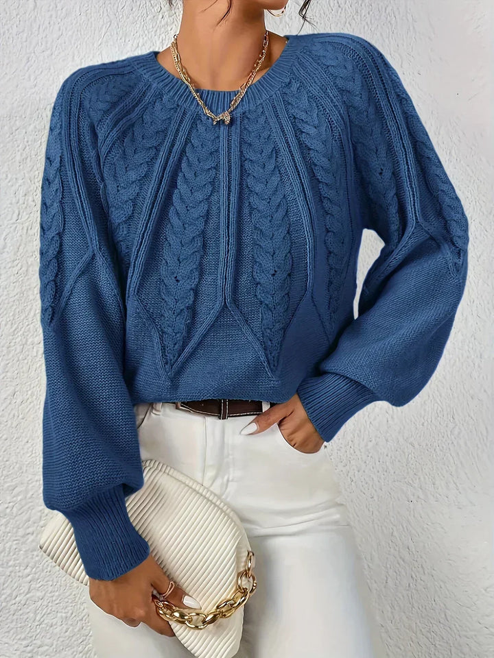 Suéter feminino de crochê com textura artesanal. Blusa de frio elegante e confortável para o inverno.