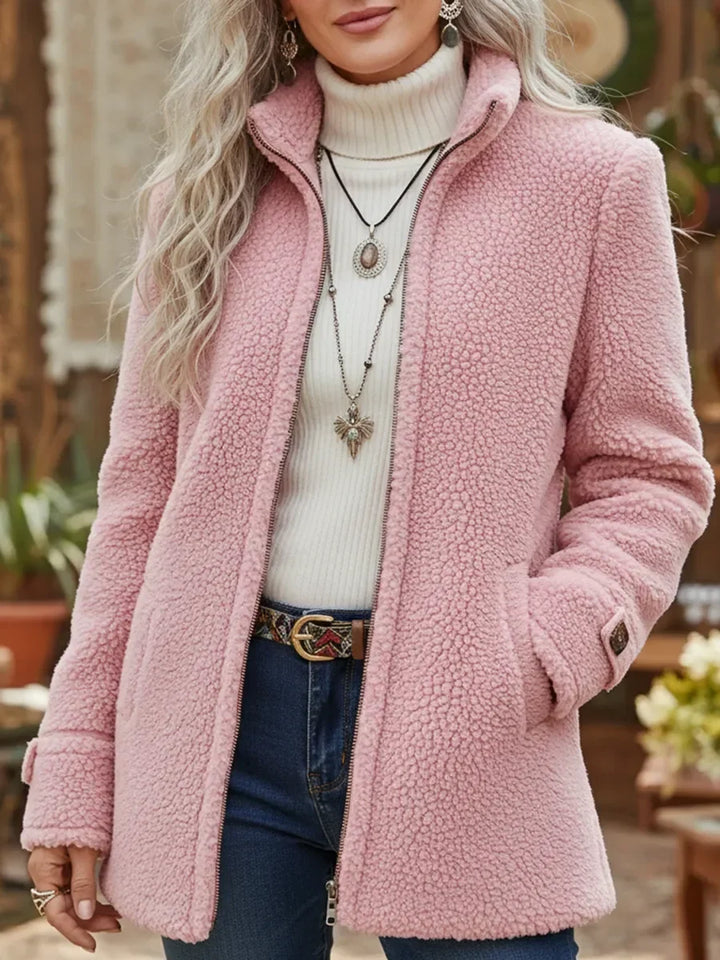 Casaco feminino elegante intermédio com fecho completo, ideal para outono e inverno. Roupa versátil e confortável.