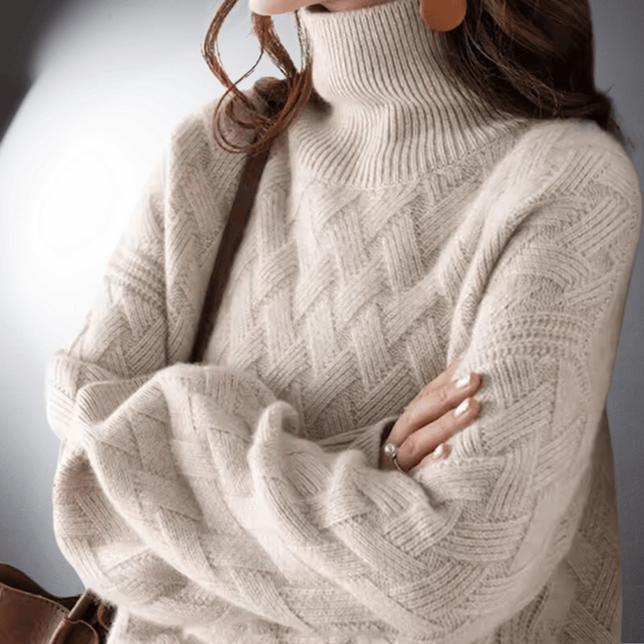 Suéter feminino oversized elegante, ideal para moda inverno. Conforto e estilo casual em malha aconchegante.