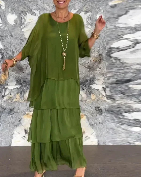Vestido feminino Evelyn elegante para festa, com design fluido em camadas. Perfeito para ocasiões especiais de verão.
