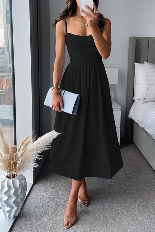 Vestido midi feminino elegante com alças finas, corte flare e tecido confortável, ideal para o verão e roupa casual.