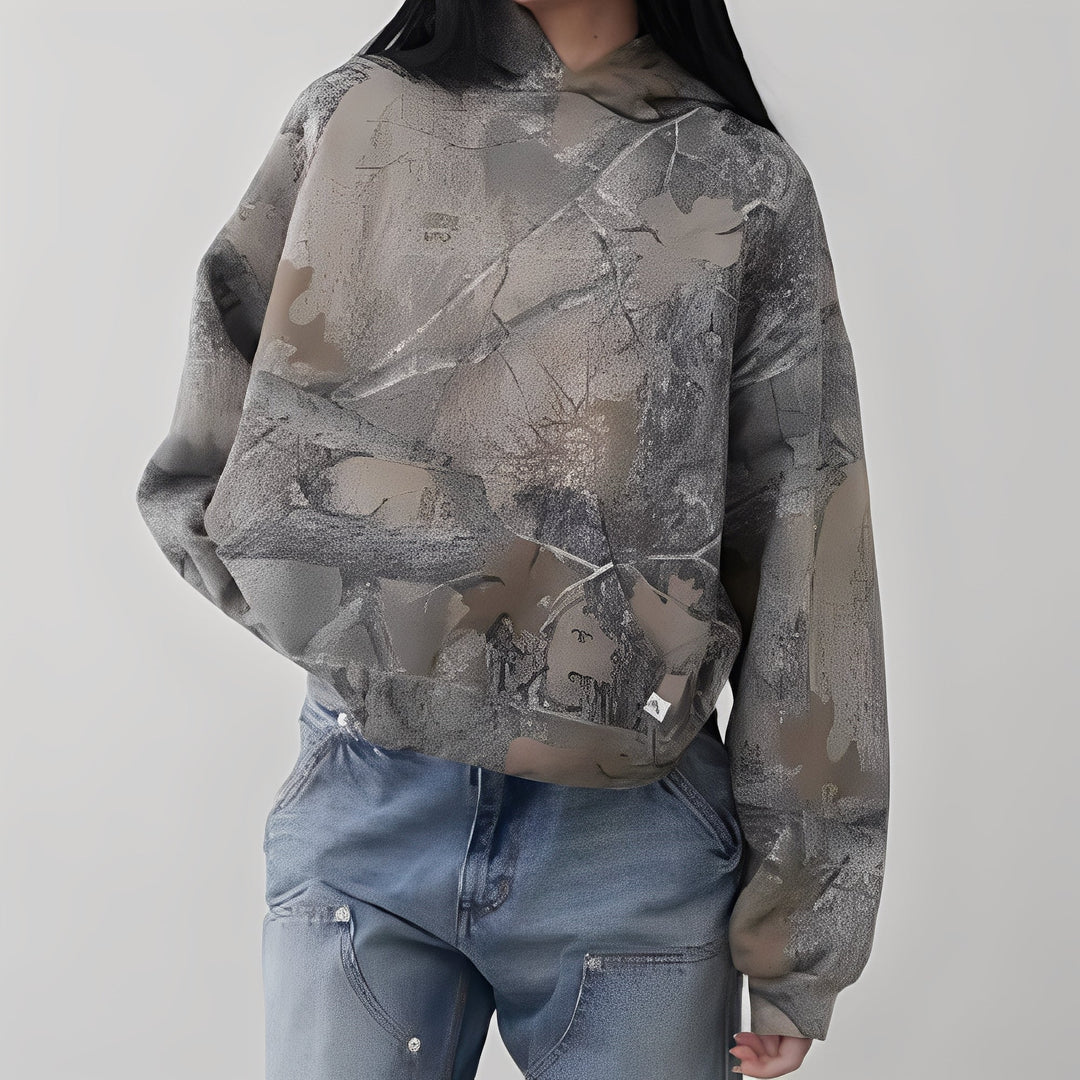 Hoodie feminino confortável com estampa camuflada, ideal para outono-inverno. Blusa de frio casual e despojada.