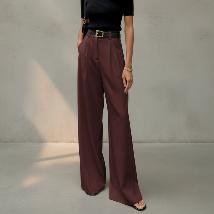Detalhe da calça feminina elegante de perna larga, evidenciando tecido de alta qualidade e cós confortável.