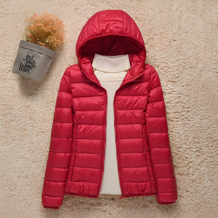 Casaco feminino Milani acolchoado com design moderno, perfeito para moda de inverno e outono.
