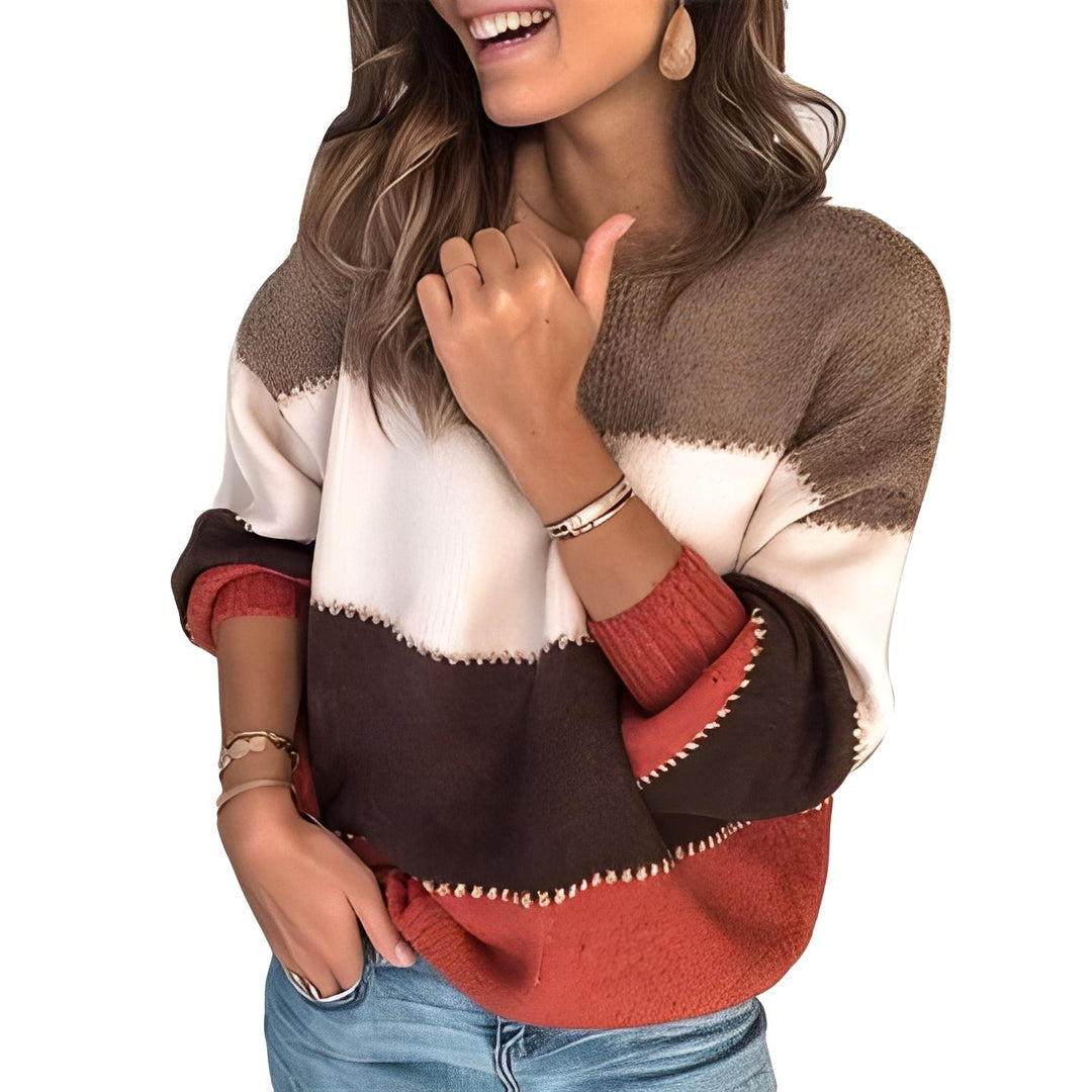 Blusa de inverno feminina com design moderno de blocos de cores. Conforto e estilo para o dia a dia.
