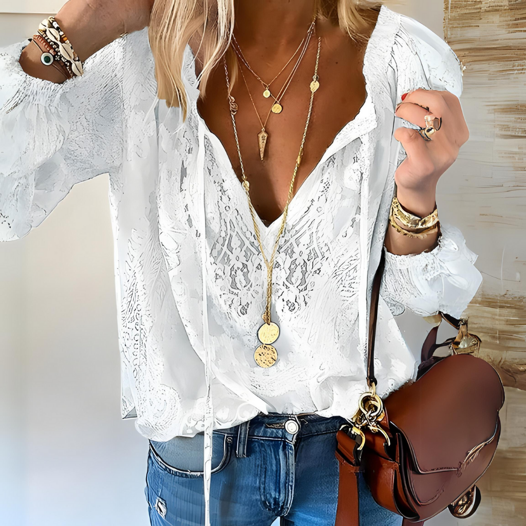 Blusa feminina casual com laço no decote, estilo boho vintage e renda. Elegante para moda primavera/verão.