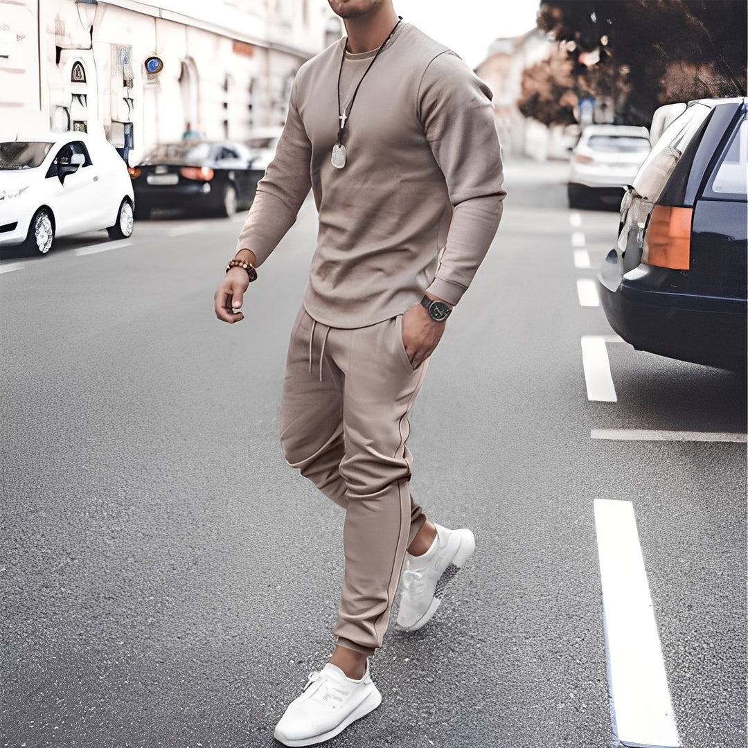 Conjunto masculino moderno com calças, agasalho casual para conforto e estilo. Roupa esportiva versátil, moda masculina.