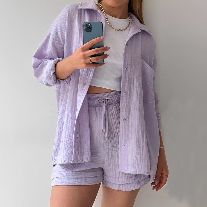 Conjunto casual feminino com blusa de lapela e calça de cintura alta, roupa versátil para diversas ocasiões.