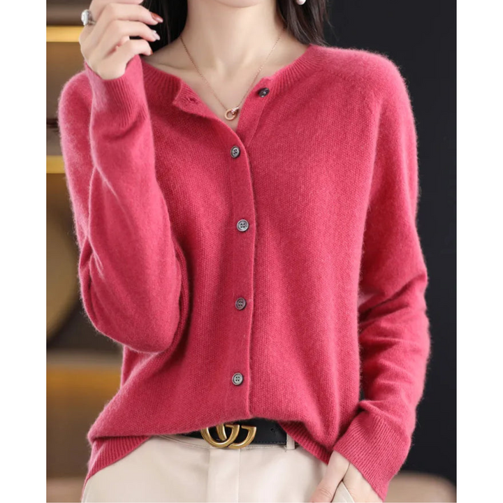 Suéter feminino elegante de malha, gola redonda, manga comprida. Ideal para inverno, conforto e estilo casual.