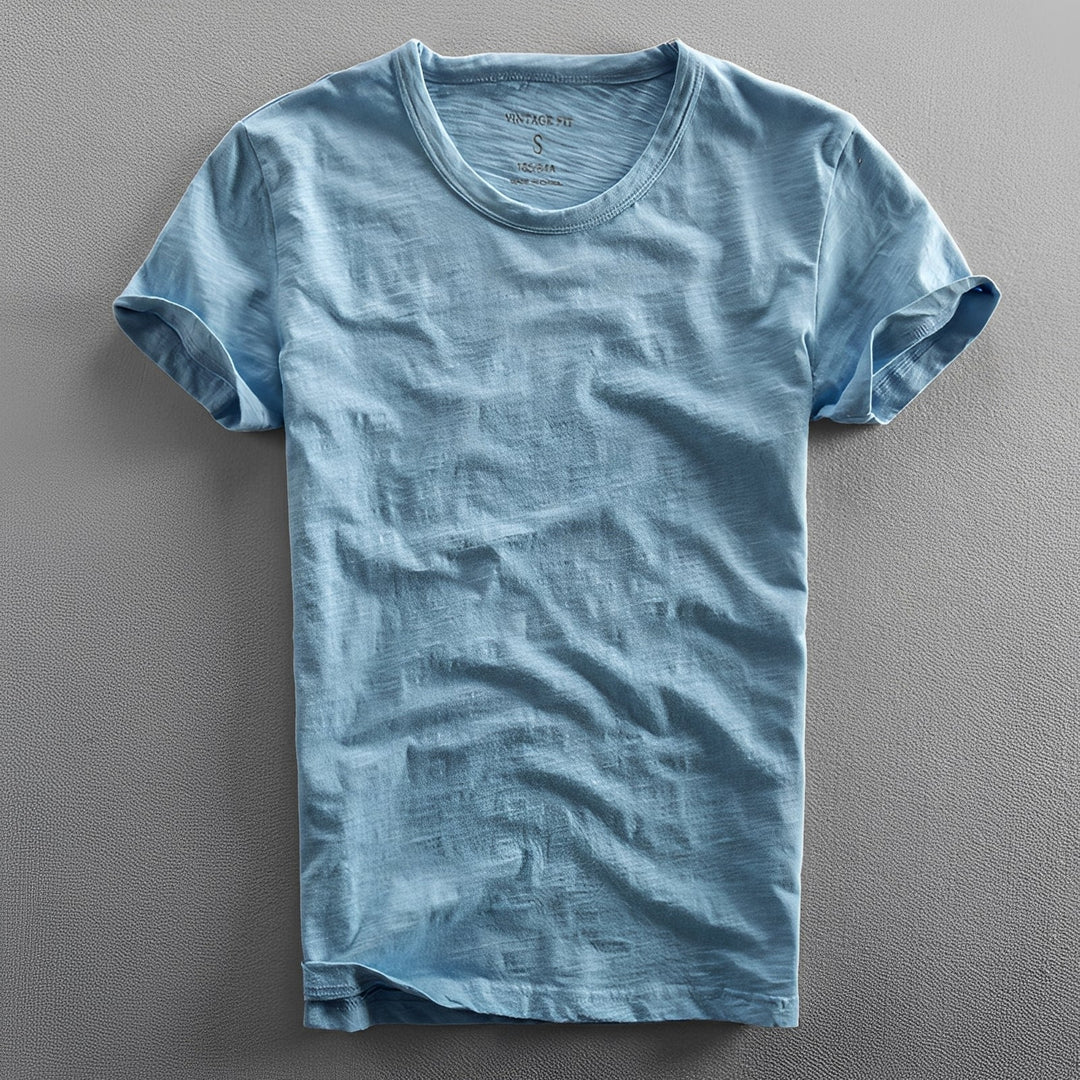 T-shirt masculina vintage lavada, para moda verão, estilo descontraído e conforto superior.