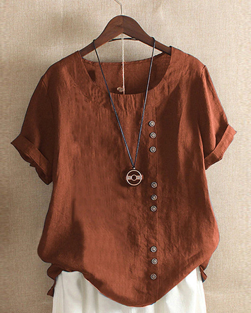 Blusa feminina simples de manga curta, gola redonda. Ideal para um look casual de verão com conforto.