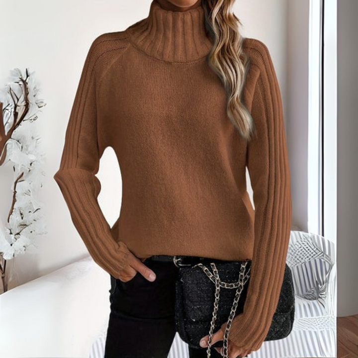 Suéter feminino de malha elegante para o inverno. Tricô moderno e aconchegante que combina estilo e conforto.