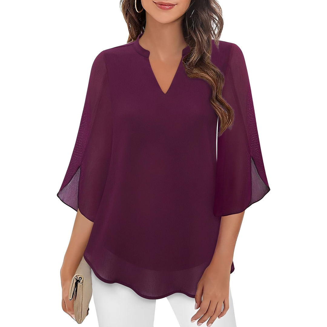 Blusa feminina solta, decote V, estilo casual e elegante. Perfeita para moda verão e conforto no escritório.