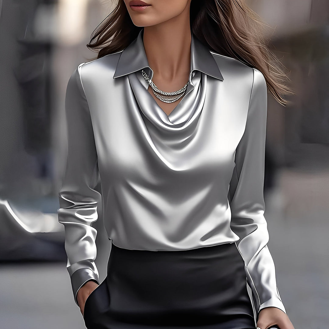 Blusa feminina elegante de manga longa com decote drapeado. Perfeita para um look sofisticado.