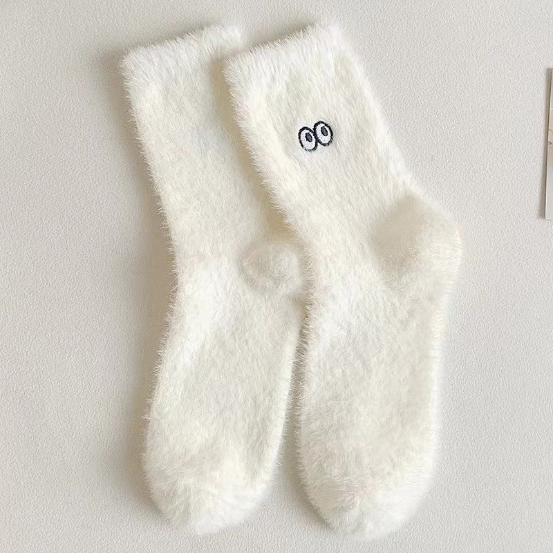 Close-up de meias femininas super fofas e aconchegantes. Perfeitas para manter os pés quentes e confortáveis no inverno.