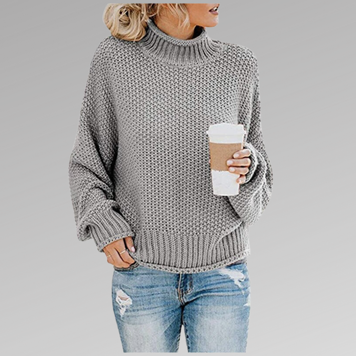Suéter feminino de malha, peça clássica da moda para um estilo elegante e confortável em qualquer ocasião.