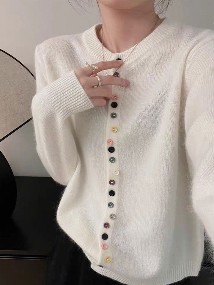 Colete de botões feminino Nora, sem mangas, para outono/inverno. Uma peça essencial de moda, versátil e confortável.