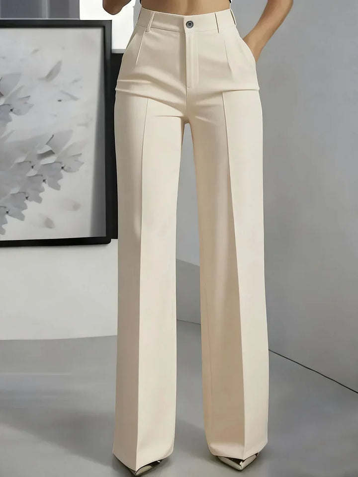 Calça de trabalho feminina cintura alta, elegante e confortável para o ambiente profissional.