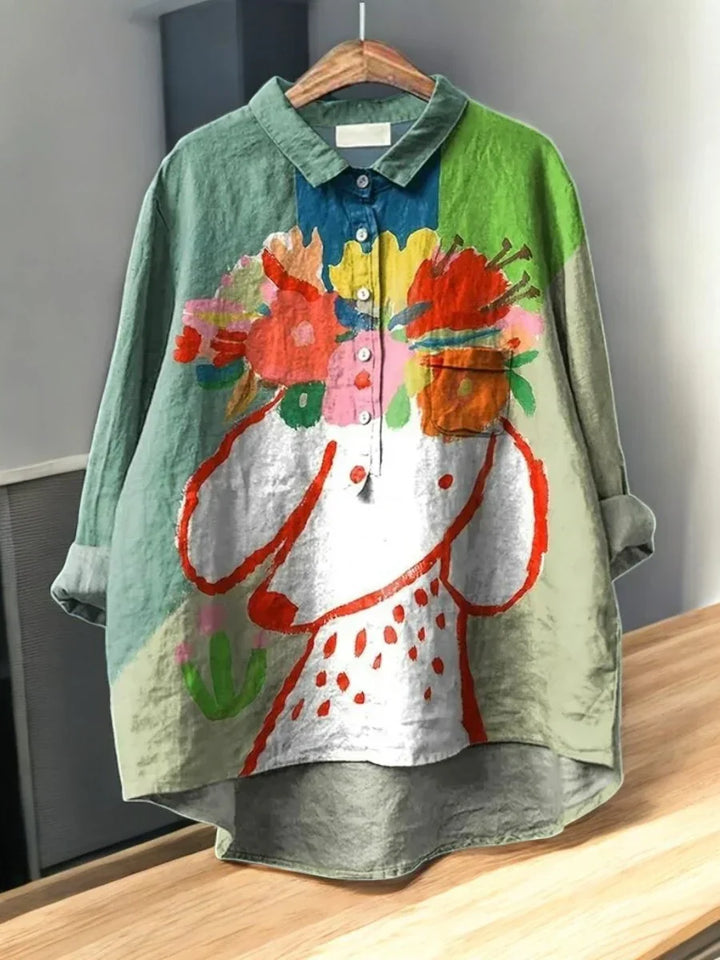 Roupa feminina: blusa floral estampada, ideal para moda casual e elegante. Conforto e estilo versátil.
