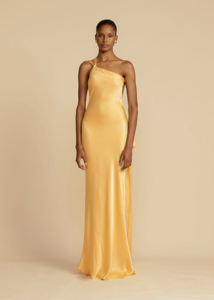 Vestido longo dourado feminino elegante, modelo ombro único, para festa e gala.