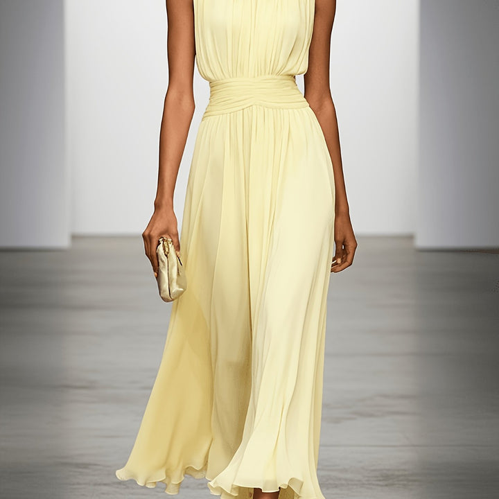 Vestido maxi Kira elegante e fluido, ideal para o verão. Conforto e estilo para ocasiões especiais e uso casual. Moda.