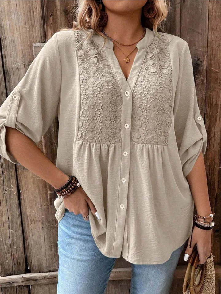 Blusa feminina elegante com decote V e botões frontais, perfeita para looks casuais ou sofisticados.