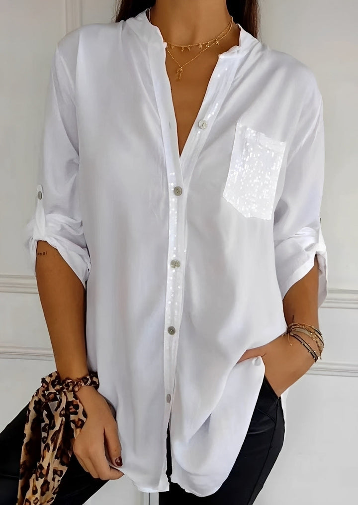 Top feminino de lantejoulas brilhantes, ideal para festas e noites elegantes. Design estiloso com glamour.