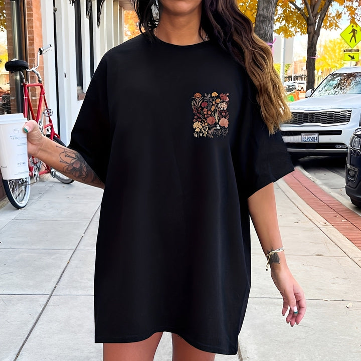 Camiseta feminina de verão com estampa floral vibrante, ideal para um estilo casual elegante e confortável.